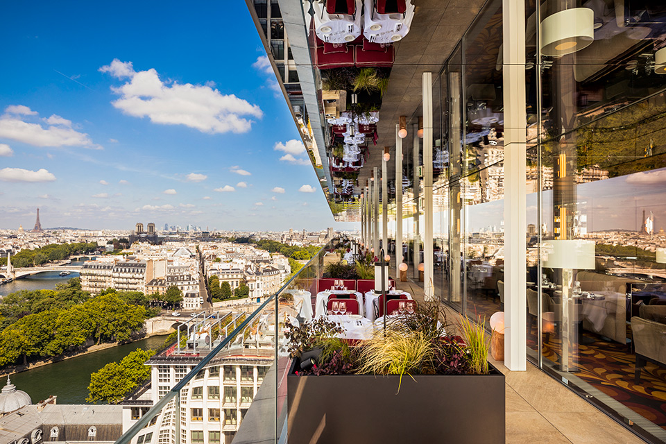 http://Outdoor%20terrace%20on%20a%20sunny%20day%20with%20views%20across%20Paris.