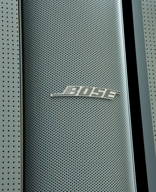 Extreme close up of a speaker with the 'Bose' logo