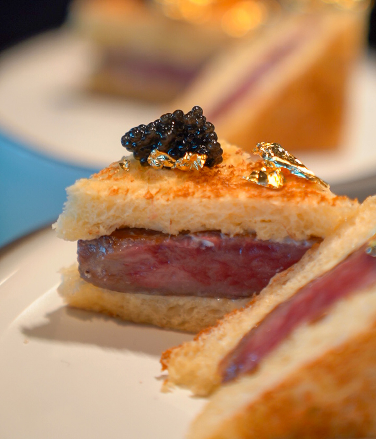 Close up of beef with caviar on a white table