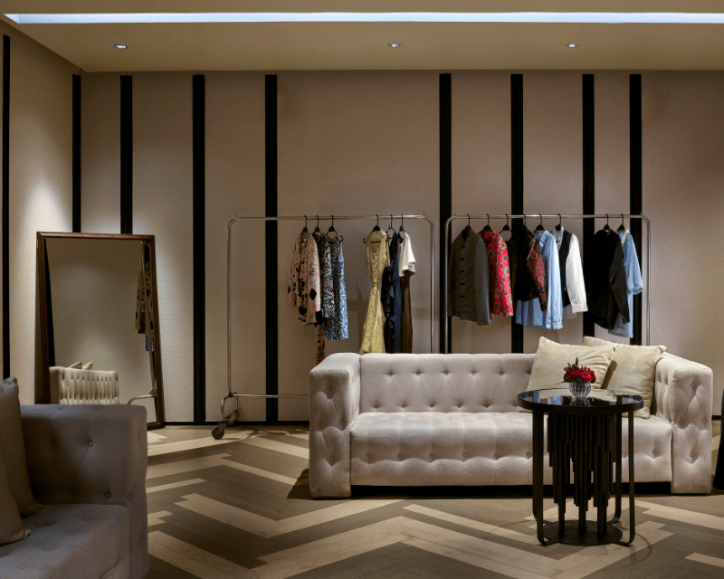 http://Meeting%20room%20at%20SO/%20Bangkok%20styled%20as%20a%20dressing%20room,%20featuring%20designer%20outfits,%20plush%20seating,%20and%20a%20modern%20fashion-inspired%20setup