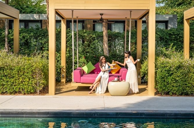 http://Relaxing%20in%20a%20shaded%20poolside%20cabana%20outside%20White%20Oven%20restaurant%20at%20SO/%20Sofitel%20Hua%20Hin