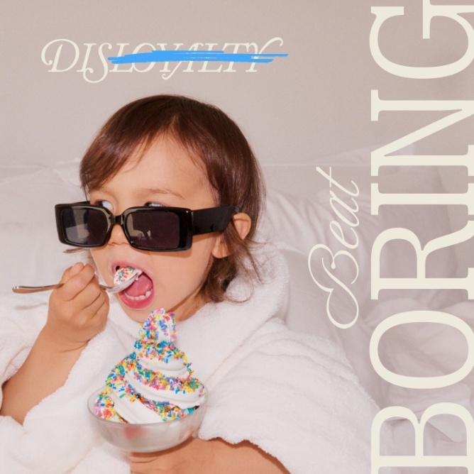Person in a white robe eating ice cream with sprinkles, with the words "DISLOYALTY" crossed out and "Beat BORING" on the image.